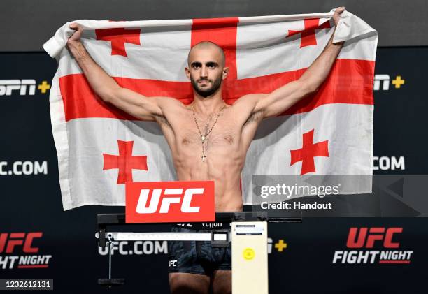 In this UFC handout, Giga Chikadze of Georgia poses on the scale during the UFC weigh-in at UFC APEX on April 30, 2021 in Las Vegas, Nevada.