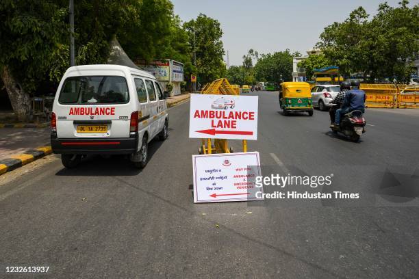 Sign points to a green corridor for ambulances made by Delhi Police at Aurobindo Marg on April 30, 2021 in New Delhi, India.