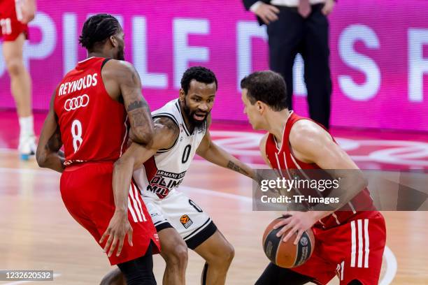 Jalen Reynolds of FC Bayern Basketball, Kevin Punter of AX Armani Exchange Milan and Zan Mark Sisko of FC Bayern Basketball battle for the ball...