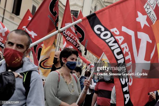 Workers belonging to left-wing autonomous trade unions protest in Piazza Santi Apostoli against the Draghi government, on May 1, 2021 in Rome, Italy....