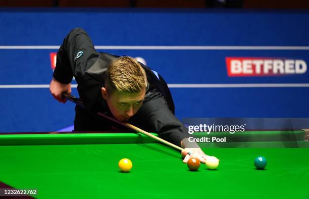 England's Kyren Wilson plays a shot during day 15 of the Betfred World Snooker Championships 2021 at Crucible Theatre on May 1, 2021 in Sheffield,...