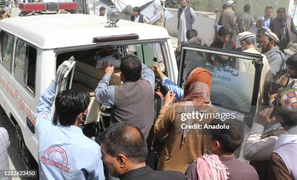 An Ambullance carry the bodies after a truck bomb attack in the capital Logar Province, Afghanistan on May 1, 2021. A truck bomb exploded in...