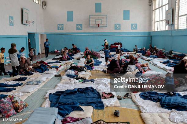 Kyrgyz citizens, who were evacuated from districts bordering Tajikistan following the fighting along the Kyrgyz-Tajik disputed border, are seen...