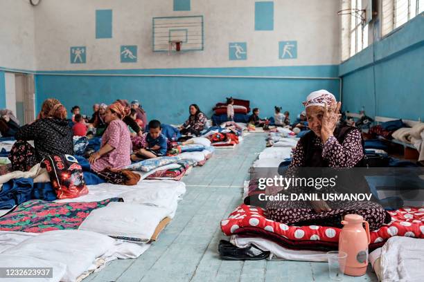 Kyrgyz citizens, who were evacuated from districts bordering Tajikistan following the fighting along the Kyrgyz-Tajik disputed border, are seen...