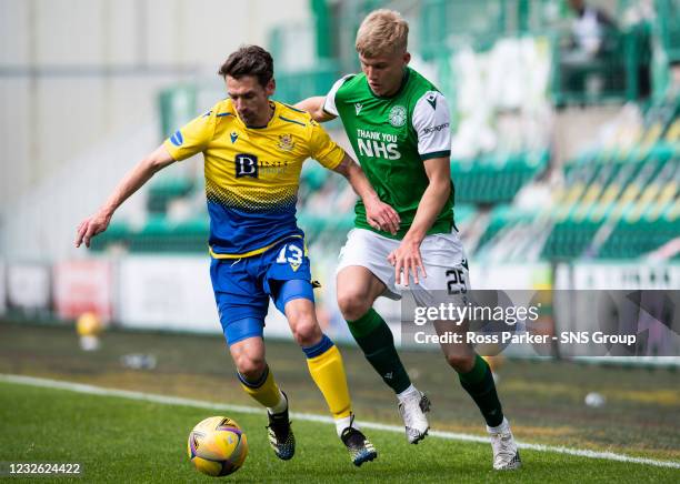 St Johnstone's Craig Bryson competes with Josh Doig during a Scottish Premiership match between Hibernian and St Johnstone at Easter Road, on May 01...