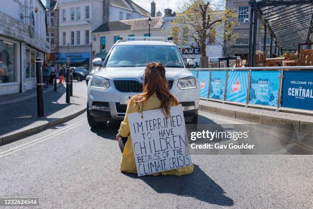 Abbey, a 24 year-old part-time waitress and self-employed dressmaker joined over 200 hundred Extinction Rebellion activists who sat alone in roads...