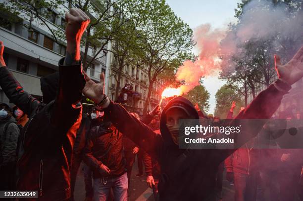 Protesters gather as they clash with police at May Day Demonstration in Paris on May 01, 2021.