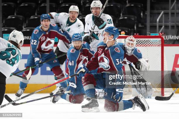 Carl Soderberg of the Colorado Avalanche drops down to block a shot by Erik Karlsson of the San Jose Sharks at Ball Arena on May 01, 2021 in Denver,...