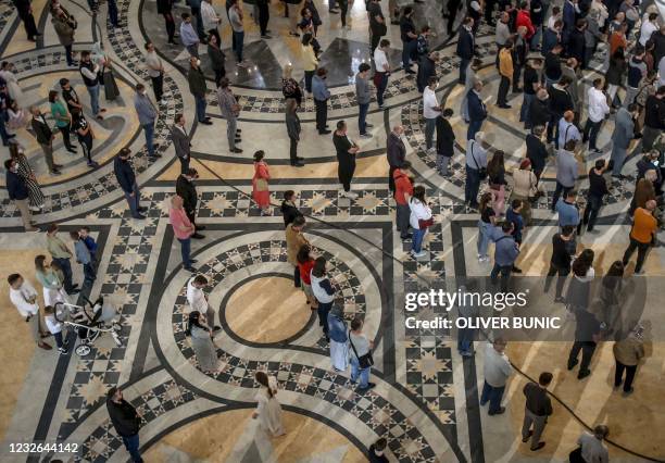 Worshippers attend an Orthodox Easter service at St. Sava Church in Belgrade, Serbia on May 2, 2021.