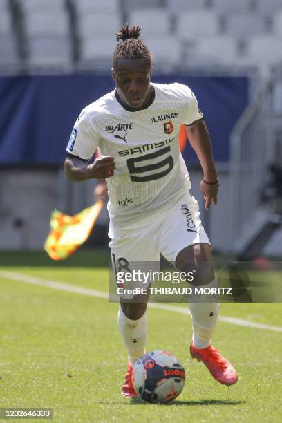 Rennes Belgian forward Jeremy Doku drives the ball during the French L1 football match between Girondins de Bordeaux and Stade Rennais at the...