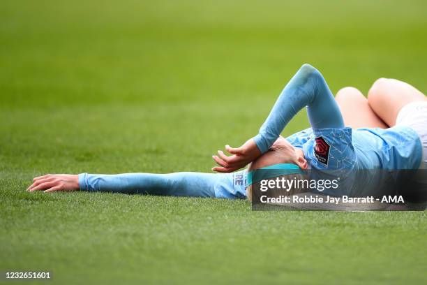 Chloe Kelly of Manchester City Women reacts after a tackle which results in her getting stretchered off during the Barclays FA Women's Super League...