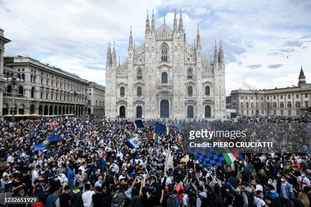 Internazionale supporters celebrate at Piazza Duomo in Milan on May 2 after the team won the Italian Serie A Championship title.