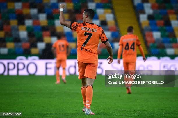 Juventus' Portuguese forward Cristiano Ronaldo celebrates after scoring a goal during the Italian Serie A football match between Udinese and Juventus...
