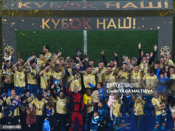 Zenit Saint Petersburg's players celebrate at Krestovsky Stadium in Saint Petersburg, on May 2 after the team won the Russian Premier League title. -...