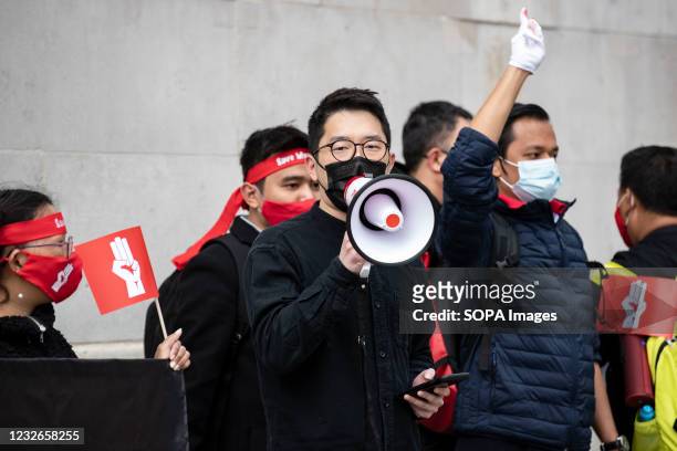 Nathan Law, an activist and politician exiled from Hong Kong speaks to the protesters during the global Myanmar Spring Revolution, outside National...