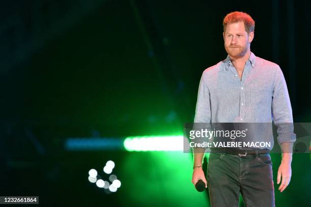 Co-Chair Britain's Prince Harry, Duke of Sussex, arrives onstage to speak during the taping of the "Vax Live" fundraising concert at SoFi Stadium in...