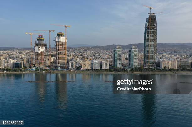 Skyscrapers under construction on the embankment of the Mediterranean port of Limassol. Cyprus, Monday, May 3, 2021. The International Monetary Fund...