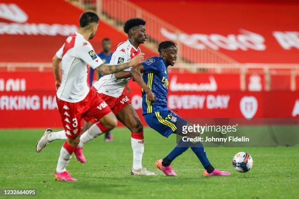 Aurelien TCHOUAMENI of Monaco and Tino KADEWERE of Lyon during the Ligue 1 match between AS Monaco and Olympique Lyon at Stade Louis II on May 2,...