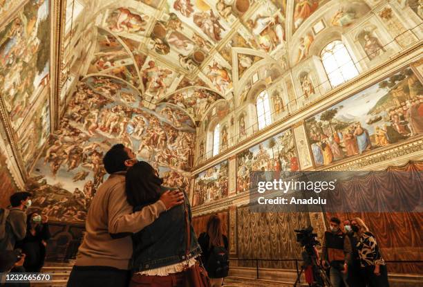 Tourist admire the Sistine Chapel, ahead of the re-opening of the Vatican Museums, at the Vatican City, on May 03, 2021. The re-opening follows the...