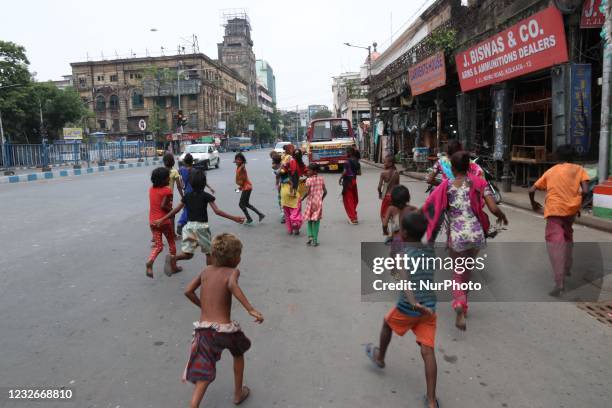 Street Children's run a deserted road during amid Coronavirus emergency in Kolkata, India, May 02,2021.
