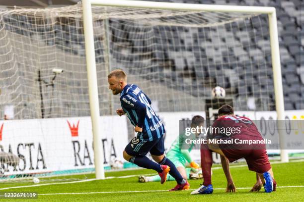 Nicklas Barkroth of Djurgardens IF scores the 1-0 goal during the Allsvenskan match between Djurgardens IF and Malmo FF at Tele2 Arena on May 3, 2021...