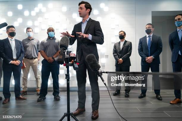 Senator Jon Ossoff, a Democrat from Georgia, speaks during a news conference following a tour of the QCells solar panel manufacturing plant in...