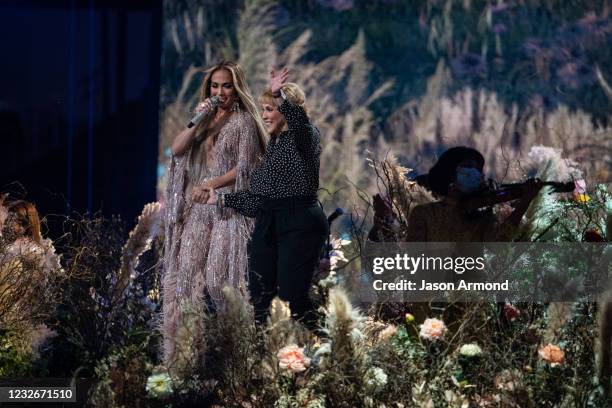 Jennifer Lopez performs with her mom, Guadalupe Rodríguez, at the Vax Live concert at SoFi Stadium on Sunday, May 2, 2021 in Inglewood, CA.