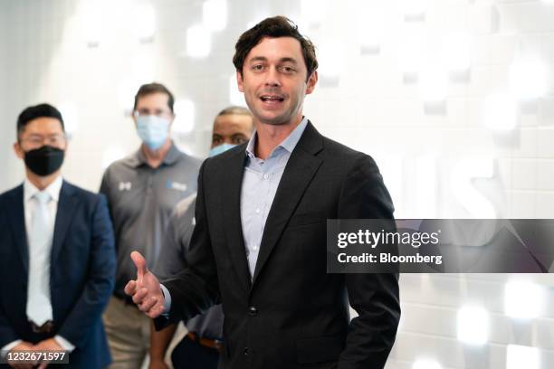 Senator Jon Ossoff, a Democrat from Georgia, speaks during a news conference following a tour of the QCells solar panel manufacturing plant in...