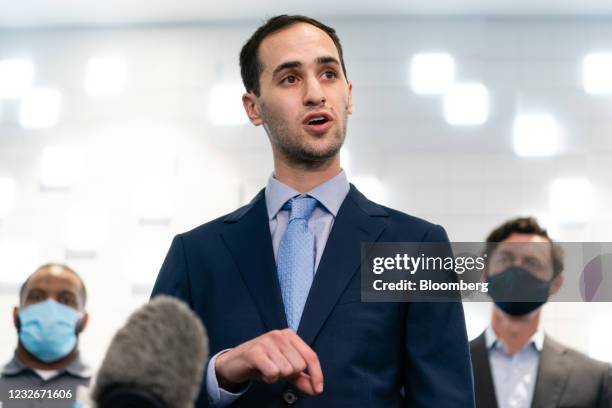 Scott Moskowitz, director of strategy and market intelligence at QCells, speaks during a news conference at the QCells solar panel manufacturing...