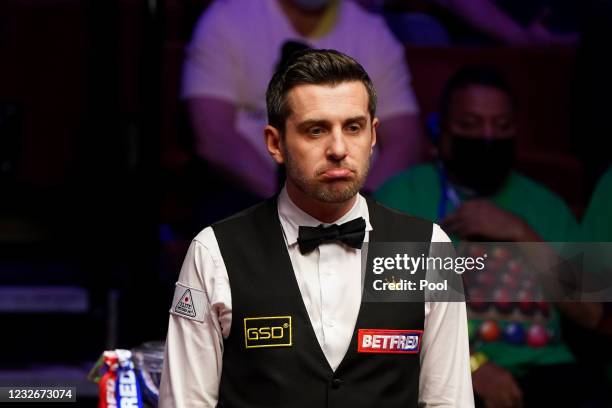 Mark Selby of England reacts during the Final between Shaun Murphy and Mark Selby on day seventeen of the Betfred World Snooker Championship at the...