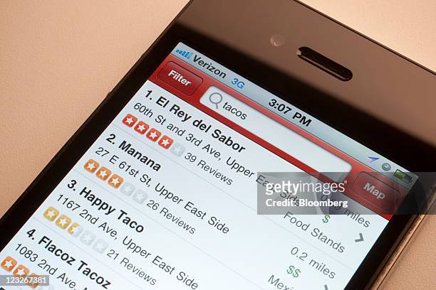 The Yelp Inc. App is displayed for a photograph on a mobile device in New York, U.S., on Wednesday, Aug. 31, 2011. Photographer: Scott...