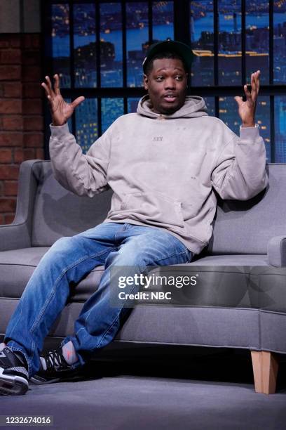 Episode 1139A -- Pictured: Comedian Michael Che during an interview with host Seth Meyers on May 3, 2021 --