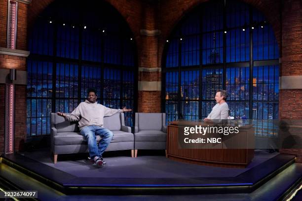 Episode 1139A -- Pictured: Comedian Michael Che during an interview with host Seth Meyers on May 3, 2021 --