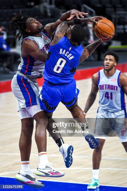 Dwayne Bacon of the Orlando Magic shoots the ball against Isaiah Stewart of the Detroit Pistons during the third quarter of the NBA game at Little...