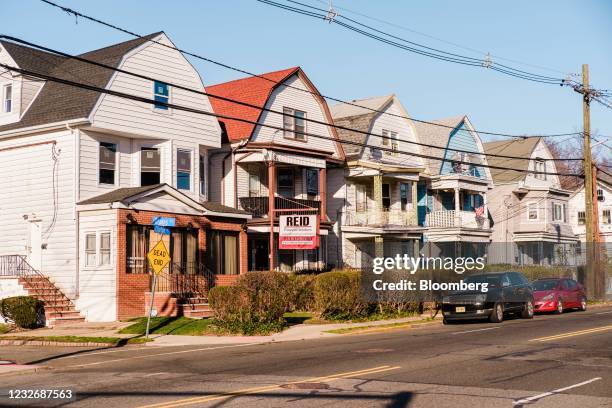 Homes in Irvington, New Jersey, U.S., on Tuesday, March 30, 2021. The U.S. Economy is on a multi-speed track as minorities in some cities find...