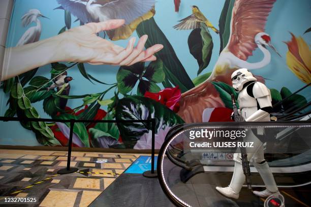 Fan dressed as a Stormtrooper from "Star Wars" participates in a gathering to celebrate "International Star Wars Day" at the Cineteca of the...