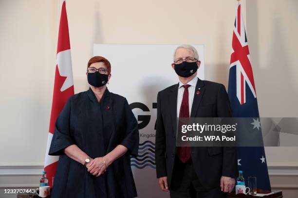 Canada's Foreign Affairs Minister Marc Garneau meets with Australia's counterpart Marise Payne pose for a photo at Lancaster House, ahead of...