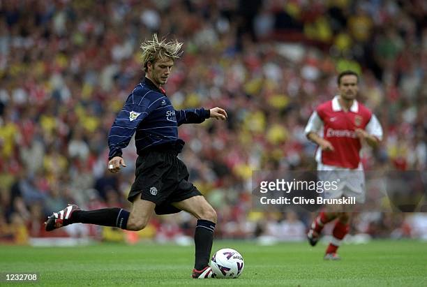 David Beckham of Manchester United in action during the FA Carling Premiership match against Arsenal played at Highbury in London, England. The match...
