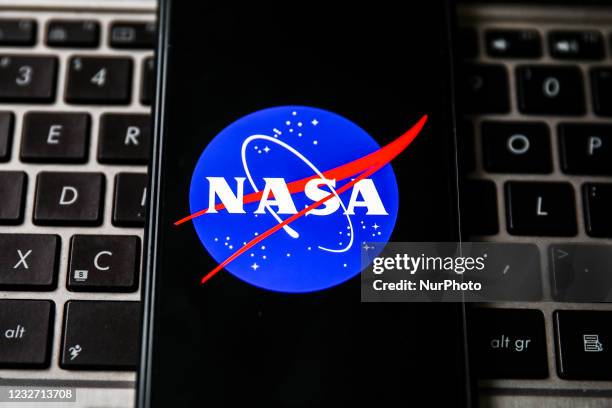 Logo is displayed on a mobile phone screen photographed for illustration photo. Gliwice, Poland on May 5, 2021.