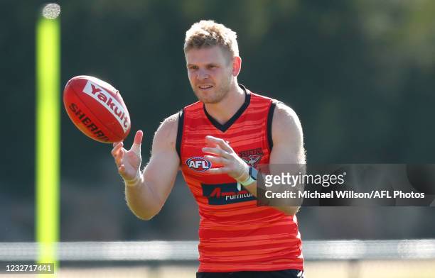 Michael Hurley of the Bombers in action during the Essendon Bombers training session at The Hangar on May 06, 2021 in Melbourne, Australia.