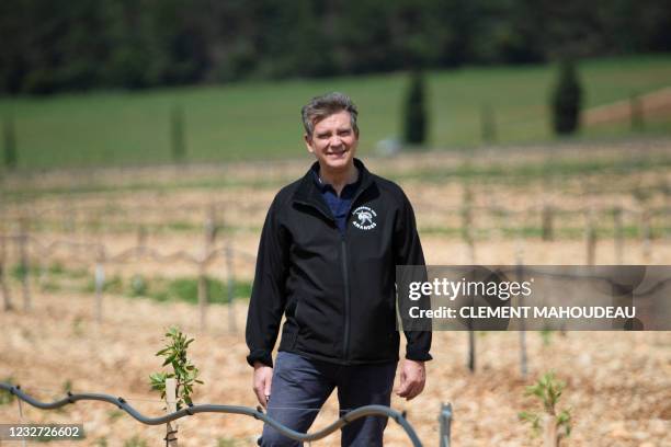 French President of the firm "Compagnie des Amandes" and former Economy minister Arnaud Montebourg poses during the inauguration of an almond orchard...