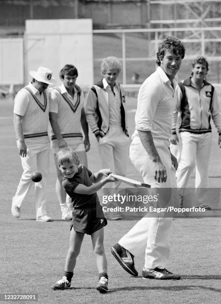 Liam Botham, son of England cricketer Ian Botham , practising his batting as England players Eddie Hemmings, Robin Jackman, David Gower and Derek...