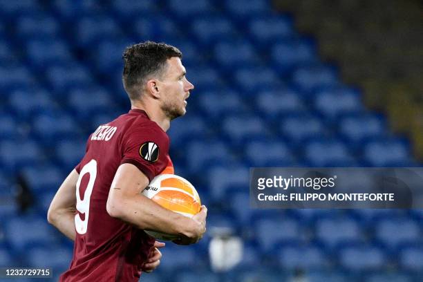 Roma's Bosnian forward Edin Dzeko celebrates after scoring a goal during the UEFA Europa League semi-final second leg football match between AS Roma...