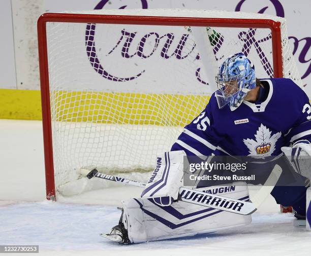 Toronto, ON- May 6 - Joseph Woll makes a save as the Toronto Marlies play the Manitoba Moose in American Hockey League action at Coca-Cola Coliseum...