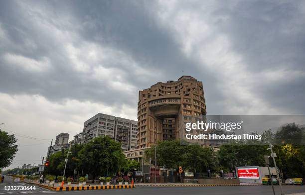 Cloudy sky over the Statesman House building at Connaught Place on May 6, 2021 in New Delhi, India. Several parts of the national capital region...