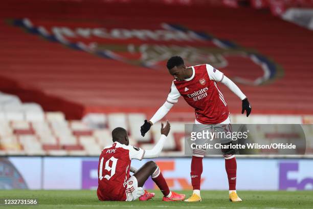 Dejected Arsenal players Nicolas Pepe and Eddie Nketiah during the UEFA Europa League Semi-final Second Leg match between Arsenal and Villareal CF at...