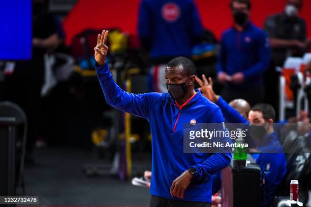 Head coach Dwane Casey of the Detroit Pistons signals during the first quarter against the Memphis Grizzlies at Little Caesars Arena on May 06, 2021...