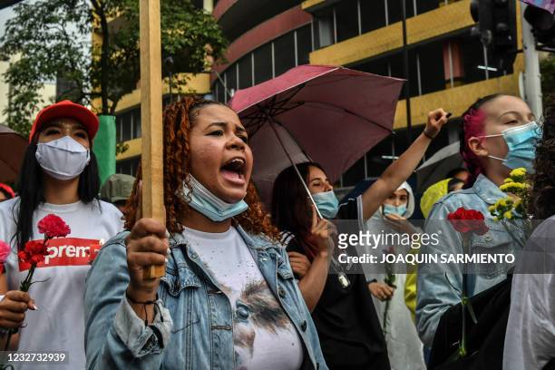Women shout slogans during a protest against President Ivan Duque's government in Medellin, Colombia, on May 6, 2021. - Colombia's government on...