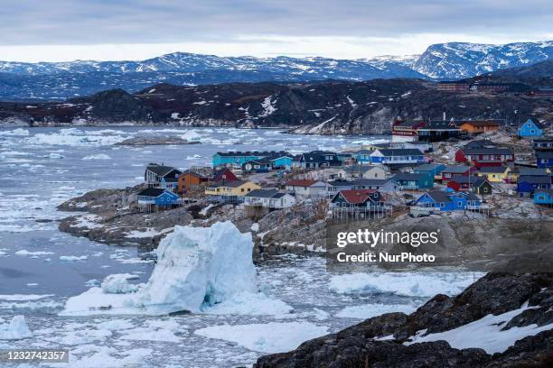 Icebergs near Ilulissat, Greenland. Climate change is having a profound effect in Greenland with glaciers and the Greenland ice cap retreating.