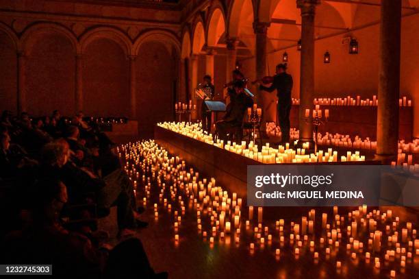 The Siegfried quintet group performs "The Four Seasons" by Italian composer Antonio Vivaldi during a candlelight concert at the Milanese pastoral...